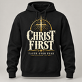 Digital mockup of Christ First Faith Over Fear black hoodie with ivory and gold-tone front graphic